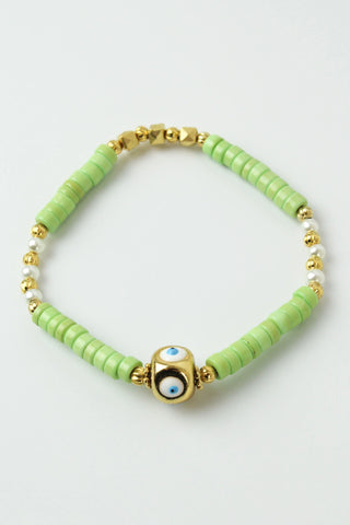 Green Beaded And Gold Eye Charm Bracelet by My Doris