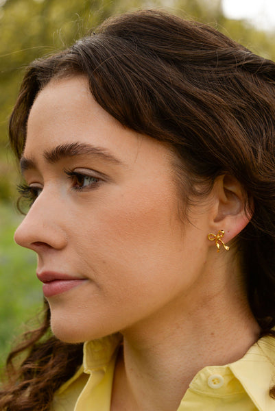 GOLD BOW STUD EARRINGS by My Doris
