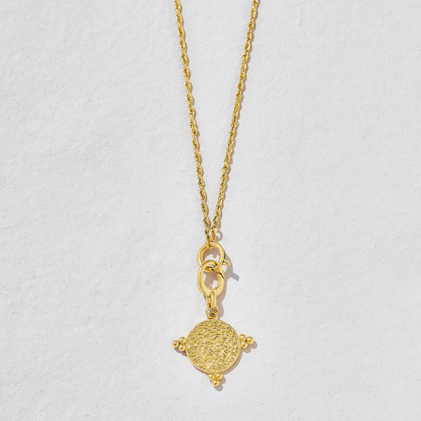 Gold Nyra Coin Charm