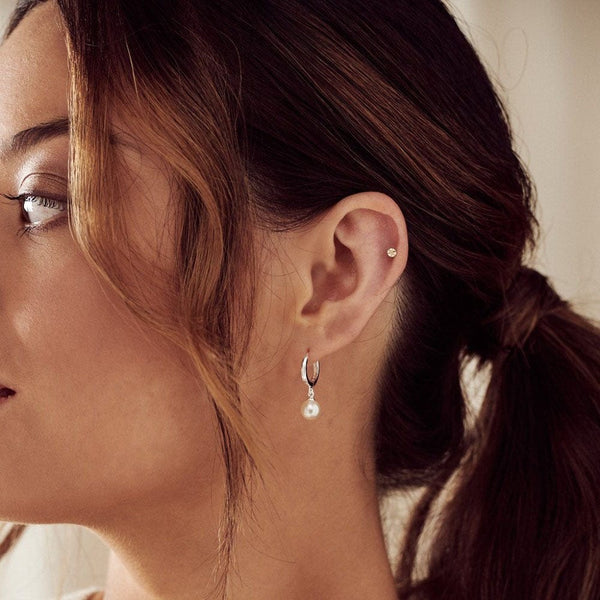 Silver Pearl Drop Huggie Hoop Earrings by Orelia