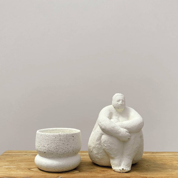 Off White Seated Woman