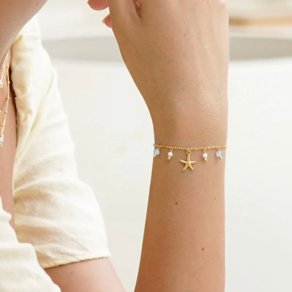 Gold Starfish Charm Bracelet by Estella Bartlett