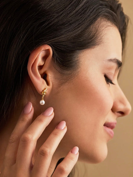 Pearl Drop Knot Stud Earrings by Estella Bartlett