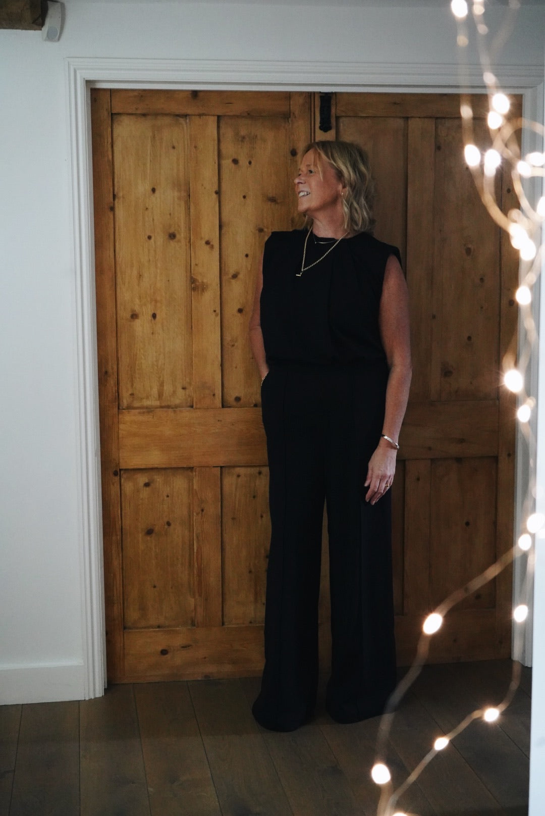 Black Pleated Front Crepe Jumpsuit by Co'Couture