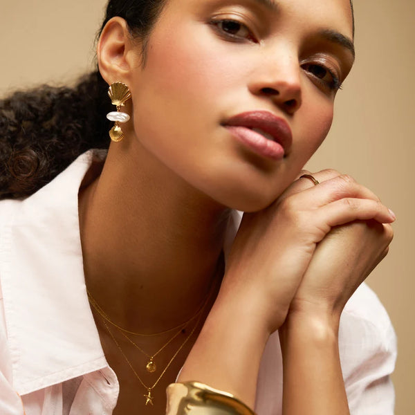 Graduated Shell & Pearl Drop Earrings by Orelia