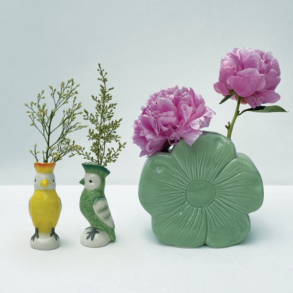 Green ceramic parrot vase