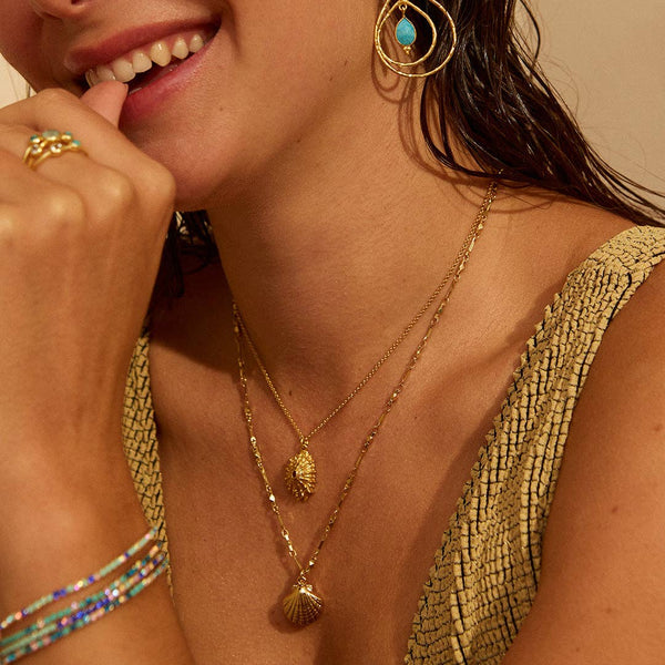 Gold Shell Estepona Pendant Necklace by Ashiana