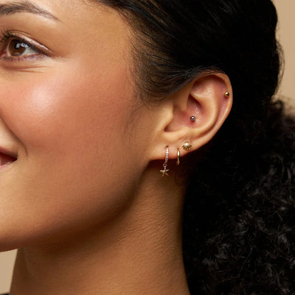 Pavé & Starfish Micro Hoop Earrings by Orelia