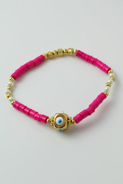 Hot Pink Beaded And Gold Eye Charm Bracelet by My Doris